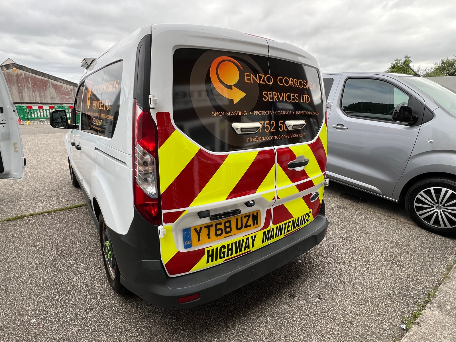 Works van with Chapter 8 highway-maintenance chevrons supplied and fitted by Omega Print & Signs