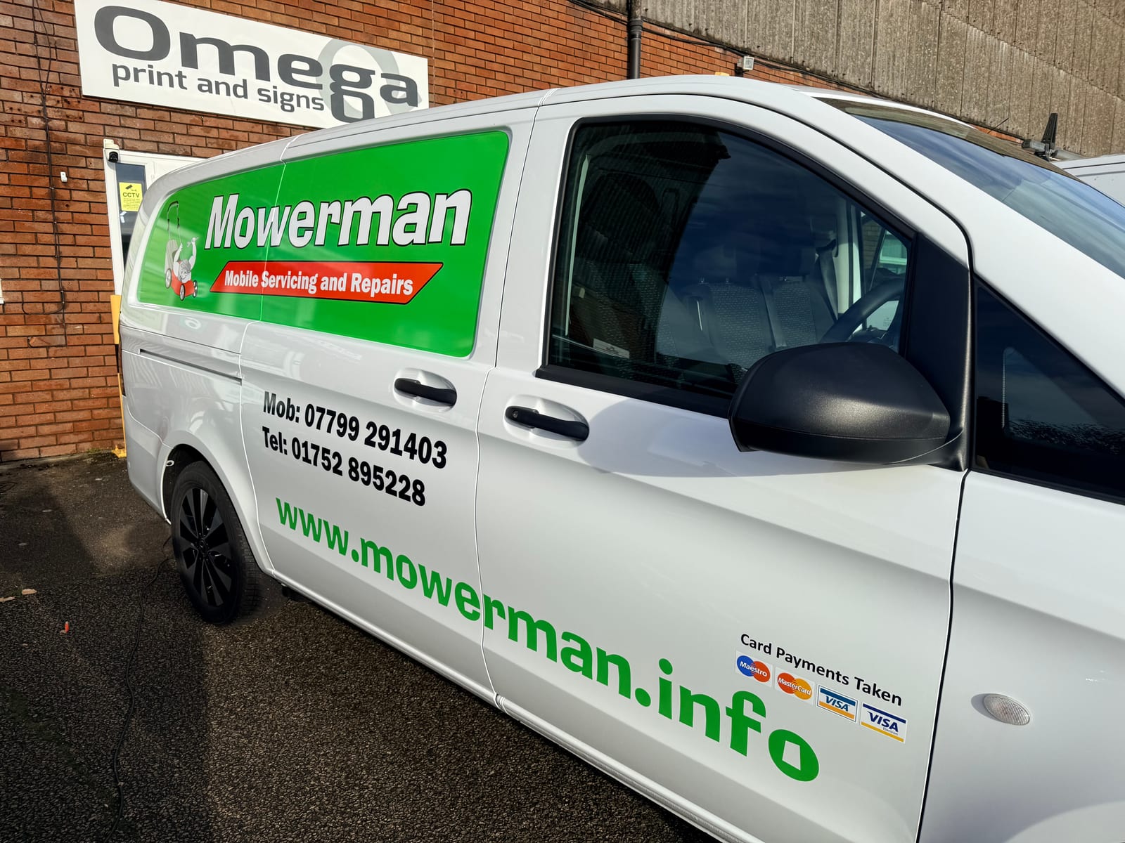 Mowerman — graphics & lettering by Omega Print & Signs
